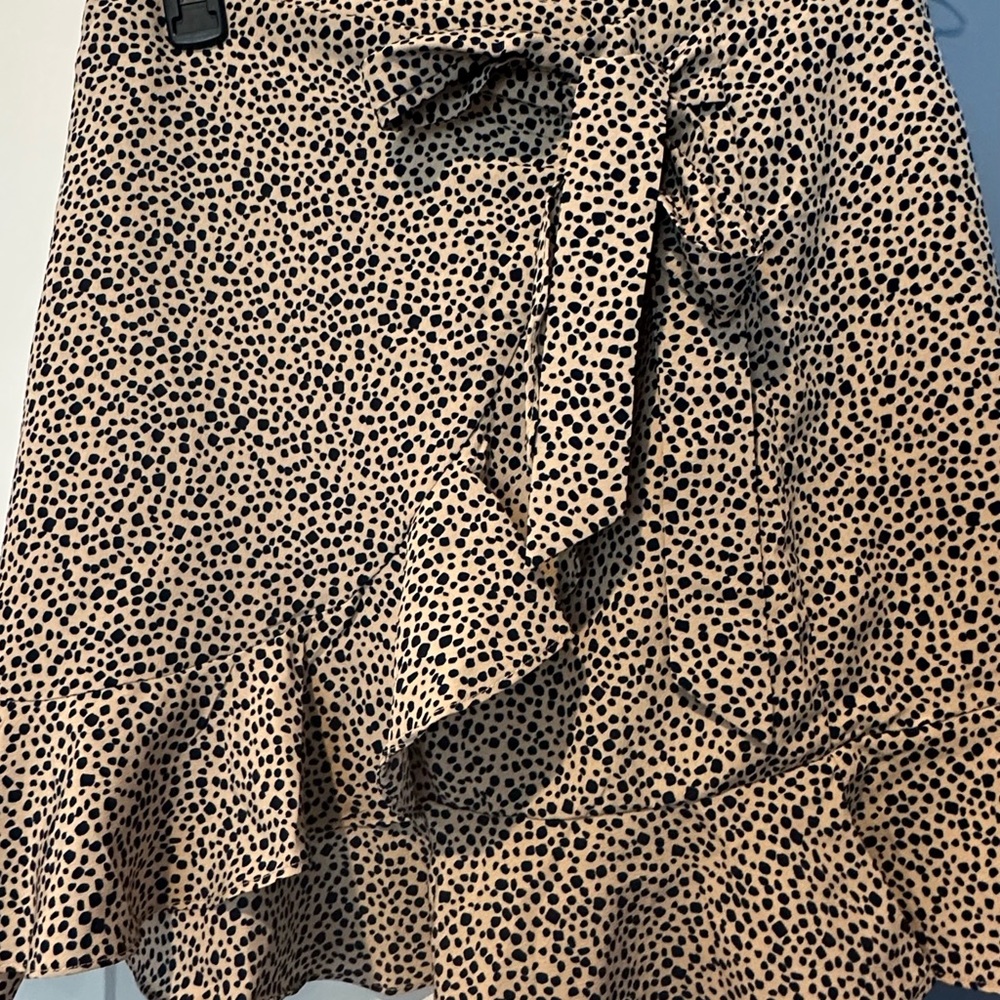 Super cute Princess polly wrap mini skirt!! In tan with navy blue poka dots.